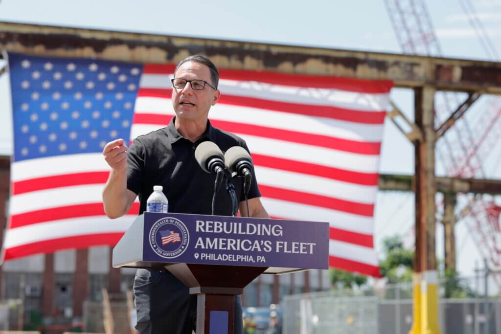 Governor Shapiro at Podium Announcing Major New Private Sector Investment to Expand Shipbuilding at Philadelphia Navy Yard